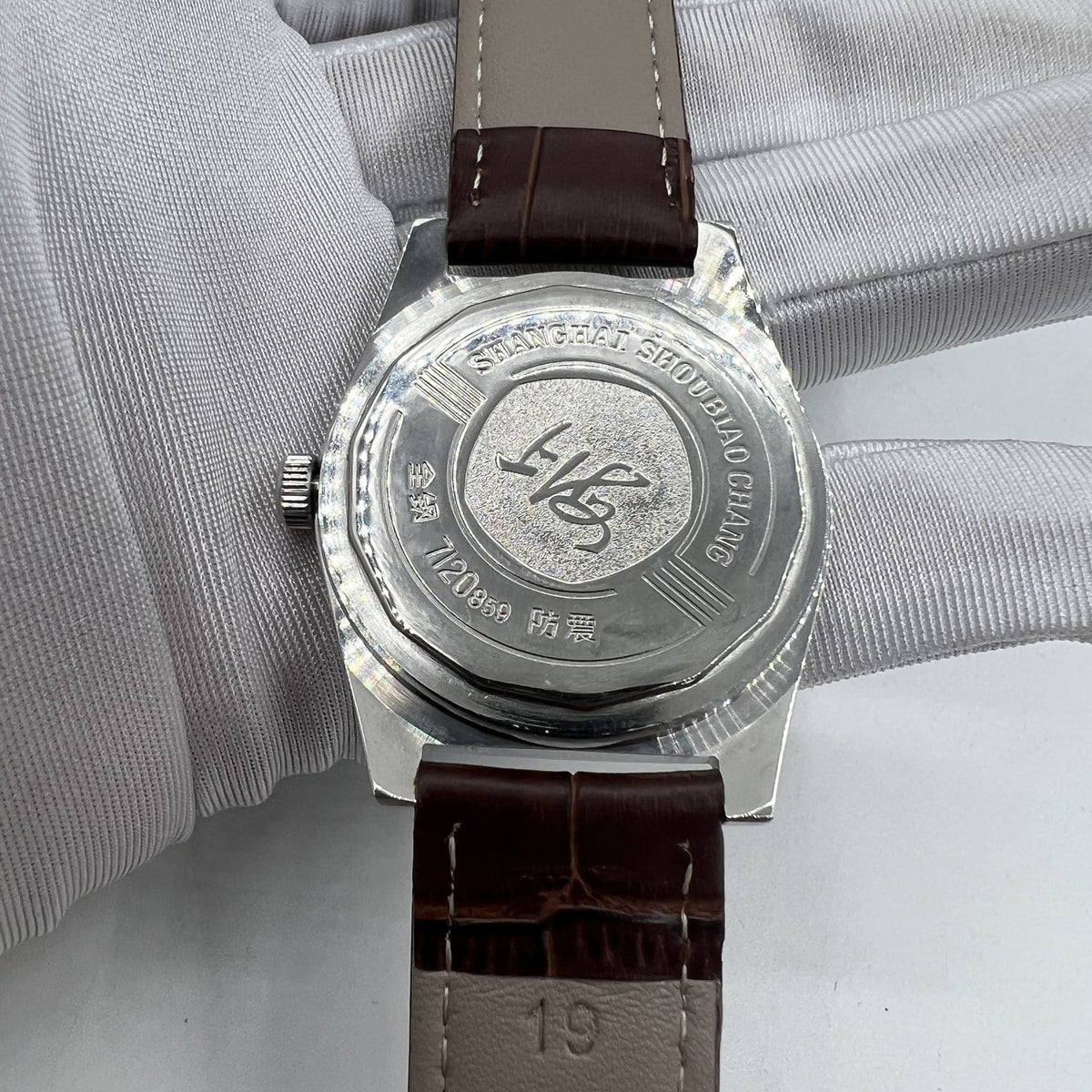 Shanghai Factory 38mm manual mechanical watch with white dial, 3 hands, 19 jewels for precise timekeeping and classic style.