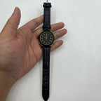 37mm automatic mechanical watch with black dial, golden Roman numerals, and 33 jewels.