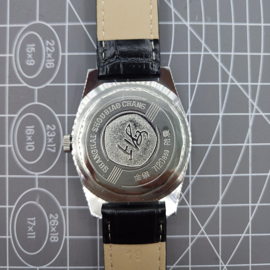 Shanghai Factory 38mm manual mechanical watch with white dial, 3 hands, 19 jewels, classic design by Shanghai Factory.