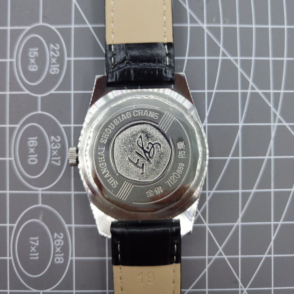 Shanghai Factory 38mm manual mechanical watch with white dial, 3 hands, 19 jewels, classic design by Shanghai Factory.