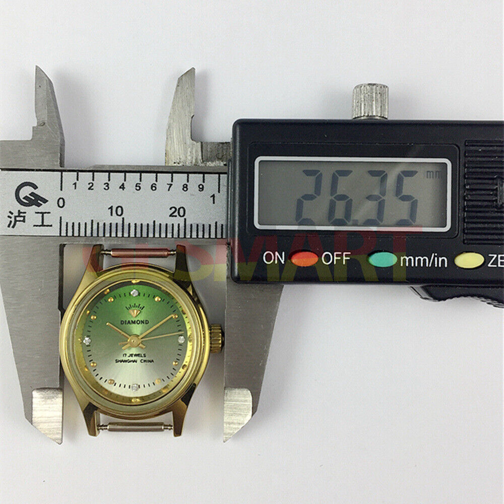 SHANGHAI DIAMOND 25mm oval lady watch with green dial, manual movement, and 17 jewels for elegant wear.
