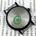 Shanghai 37mm manual mechanical watch with single calendar, black dodecagonal case, and leather strap.
