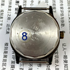 Shanghai Factory 34mm manual mechanical watch, black dial, 19 jewels, shock-resistant design.