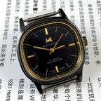 Shanghai Factory 34mm manual mechanical watch with black dial, 19 jewels, shock-resistant for durable wear.
