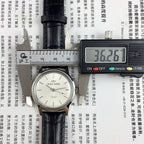 Beijing 36mm Double Rhomb watch with silver case and silver nail straps, manual mechanical movement, elegant design.