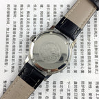 Beijing 36mm Double Rhomb watch with silver case and silver nail straps, manual mechanical movement, elegant style.