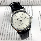 Beijing 36mm Double Rhomb watch with silver case and silver nail straps, manual mechanical movement, elegant style for formal wear.