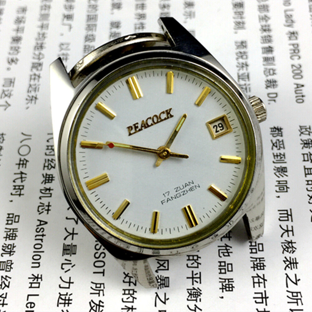 Liaoning Factory mechanical watch with peacock dial, 17 jewels, shock-resistant design for durability.