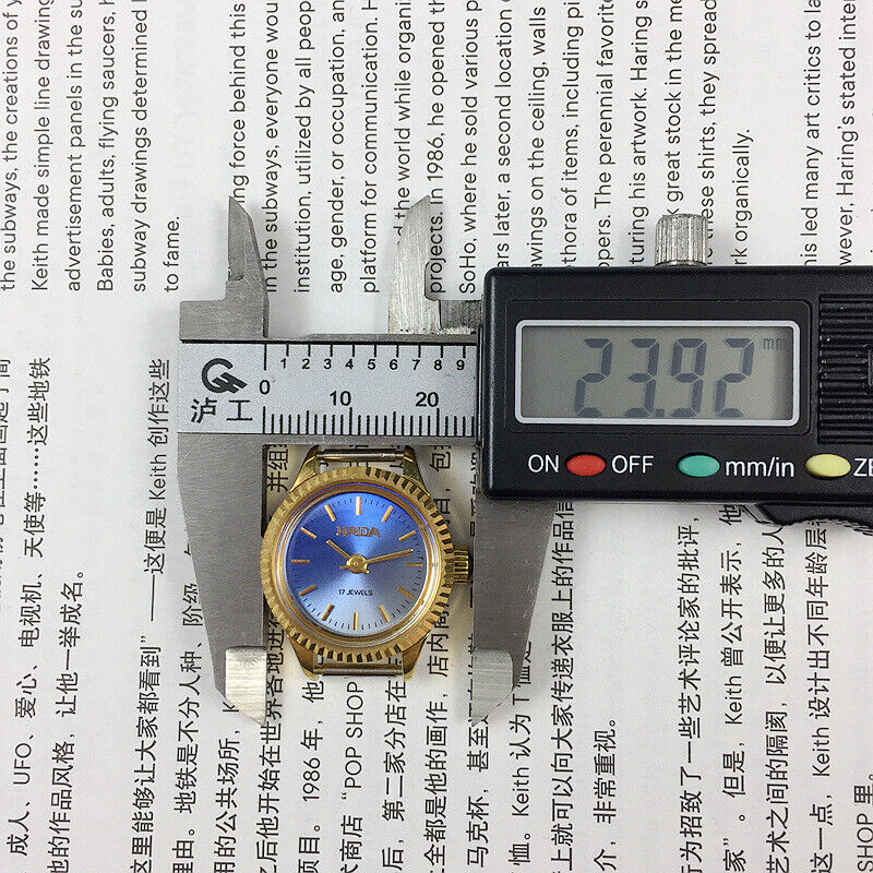 HAIDA 23mm golden nail watch for women with gradient blue dial and 17-jewel manual movement.