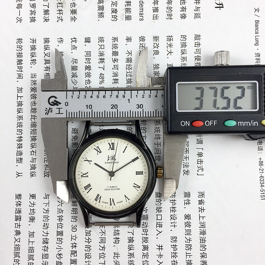 37mm Shanghai Factory manual mechanical watch with Roman numerals, 17 jewels, classic design.