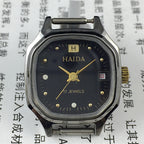 Manual mechanical lady watch with octagonal case, imitation diamonds, 17 jewels, elegant design for formal wear.