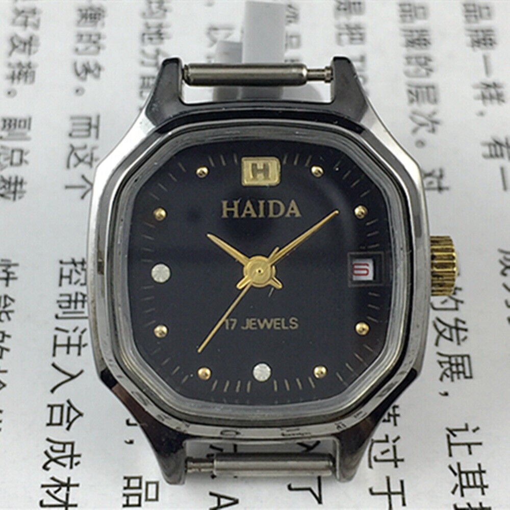 Manual mechanical lady watch with octagonal case, imitation diamonds, 17 jewels, elegant design for formal wear.