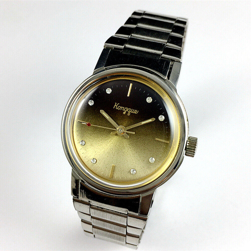 China Kongque Steel manual watch featuring 17 jewels and a gradual golden brown dial with elegant design.