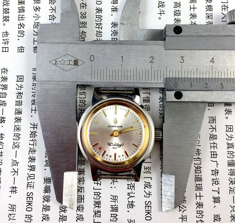 26mm Kongque Lady Watch with silver dial, manual mechanical movement, steel band, elegant design.