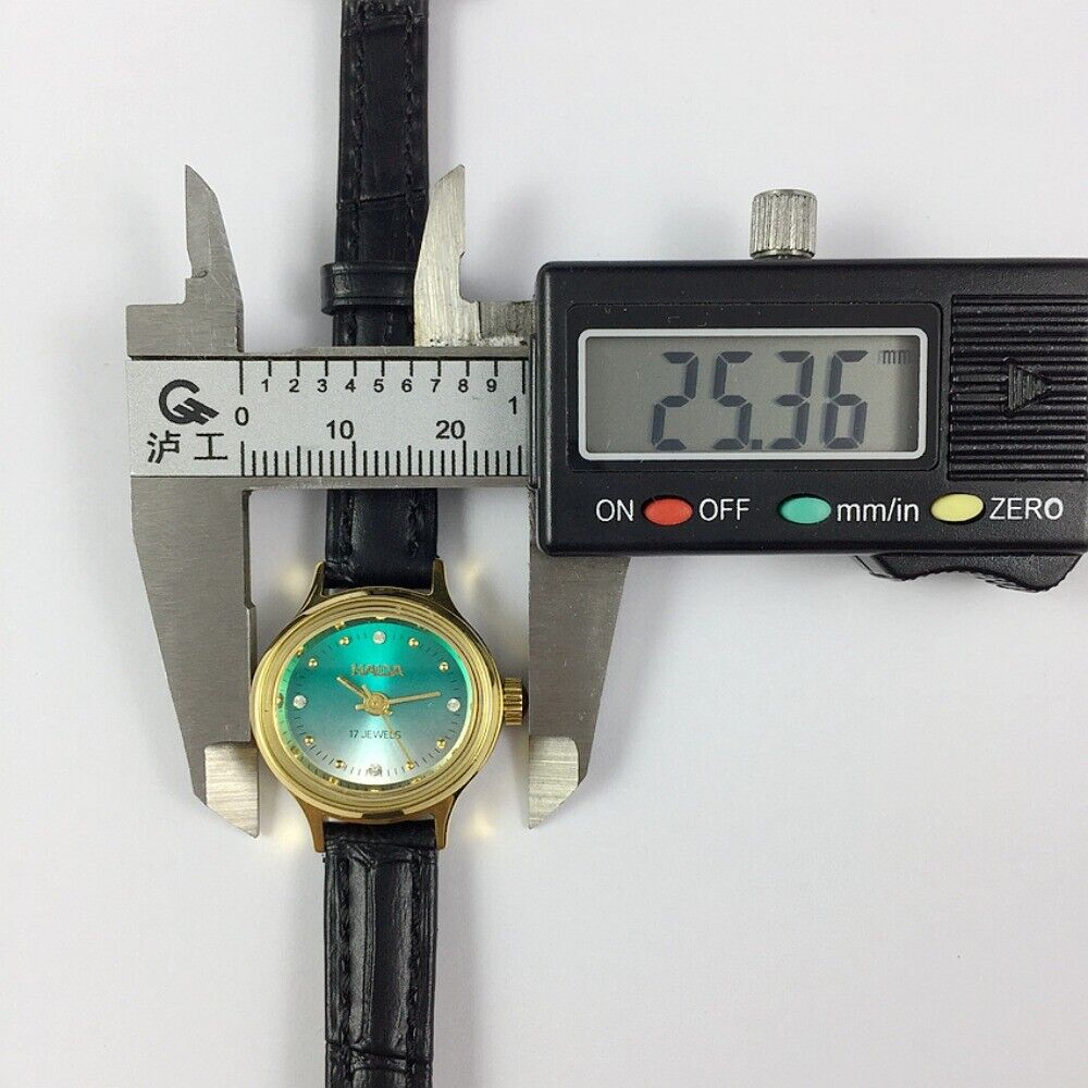 HAIDA Lady's manual mechanical watch with golden nails, 17 jewels, gradient green oval dial for elegant timekeeping.
