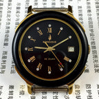 37mm automatic mechanical watch with 33 jewels, black dial and golden Roman numerals.
