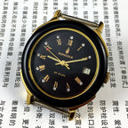37mm automatic watch with black dial, golden Roman numerals, and 33-jewel mechanical movement.