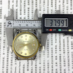 Dandong 37mm Peacock manual watch with golden dial, 33 jewels, and single calendar feature.