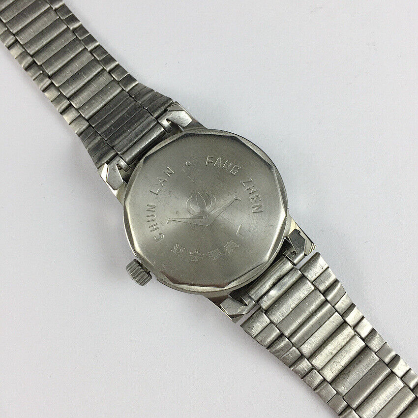 Chunlan 33mm manual mechanical watch with silver dial and steel band, 17 jewels, classic design.