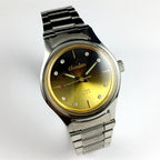 China Chunlan Steel mechanical watch with 17 jewels, gradual golden brown dial, and classic design.