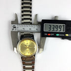 China Donglang Steel automatic mechanical watch with 17 jewels, golden dial, and matching steel band for elegant style.