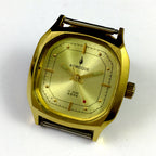 China Kongque 34mm manual steel watch with 17 jewels and golden dial featuring nail markers for elegant style.