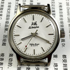 32mm Shanghai Factory manual mechanical watch with 19 jewels, shock-resistant design for durability.