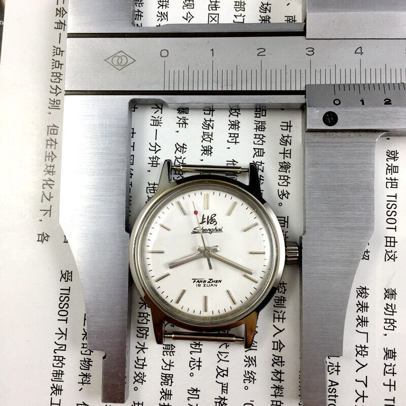 32mm Shanghai Factory manual mechanical watch with 19 jewels, shock-resistant design for lasting precision.