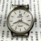 Silver 32mm Shanghai Factory manual mechanical watch with silver case and nail markers, classic design