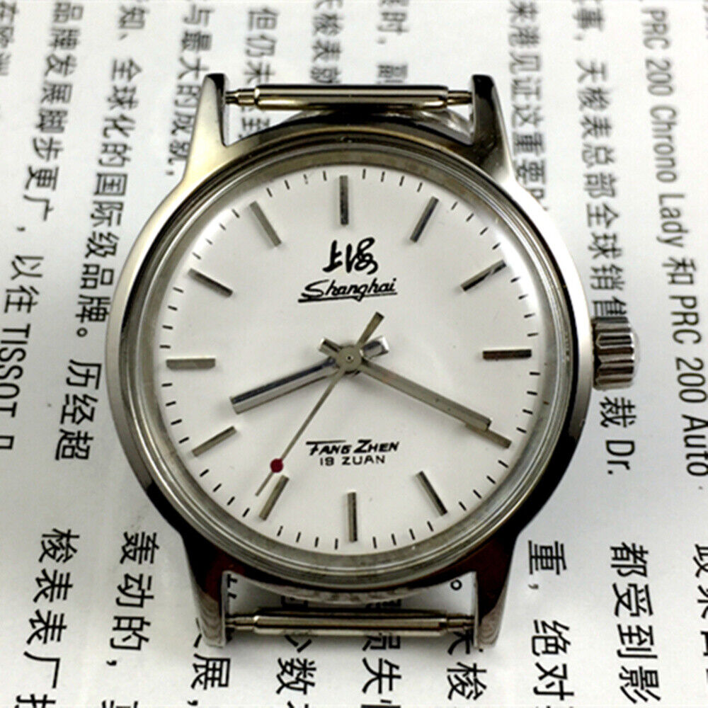 Silver 32mm Shanghai Factory manual mechanical watch with silver case and nail markers, classic design