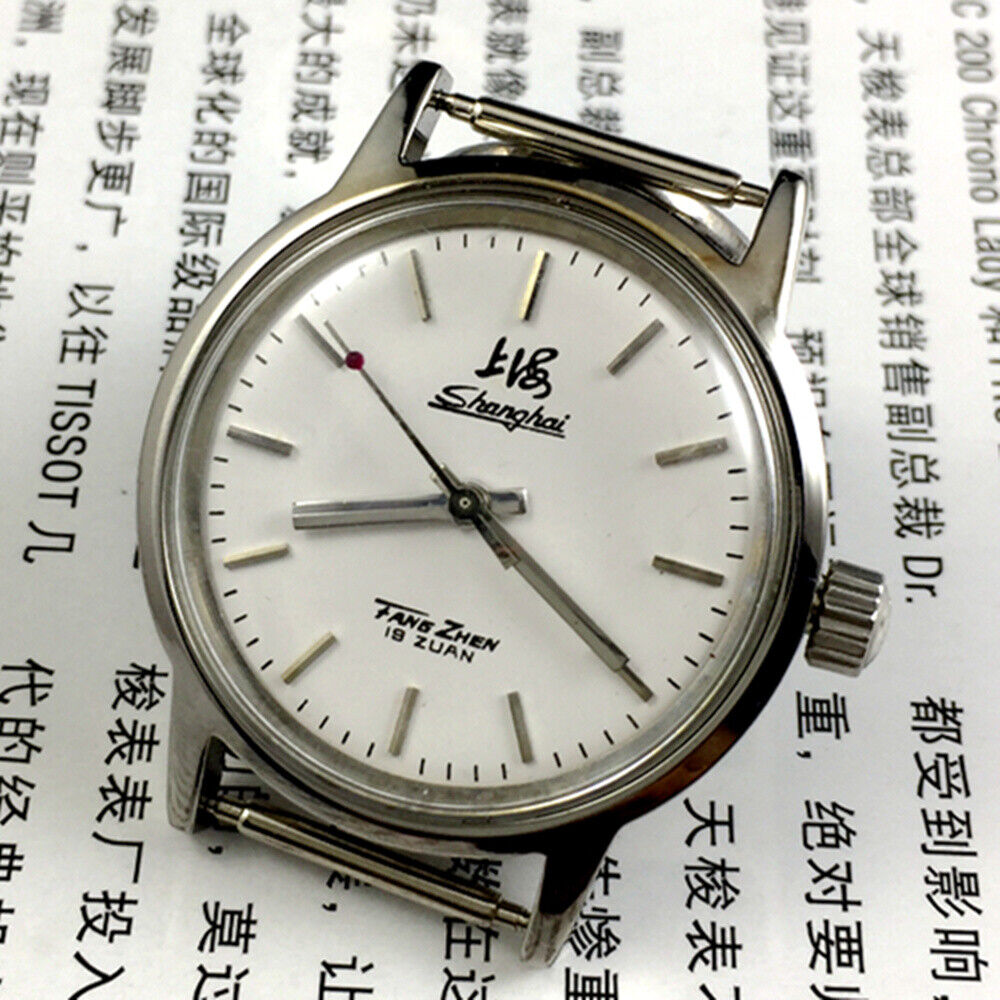 Silver 32mm Shanghai Factory manual mechanical watch with silver case and nail markers, classic design