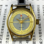 TAISHAN manual mechanical lady watch with 19 jewels, yellow-grey dial, and round golden case for elegant style.