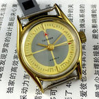 TAISHAN manual mechanical lady watch with 19 jewels, yellow-grey dial, and round golden case for elegant style.