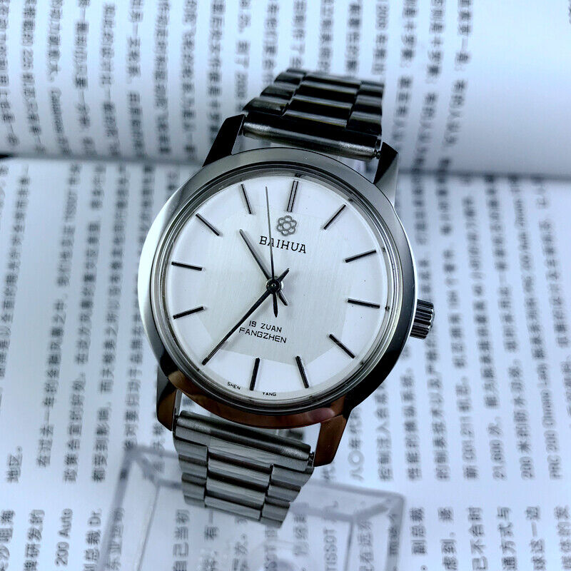 China Baihua 37mm manual mechanical watch with silver dial, 19 jewels, durable shock-resistant design