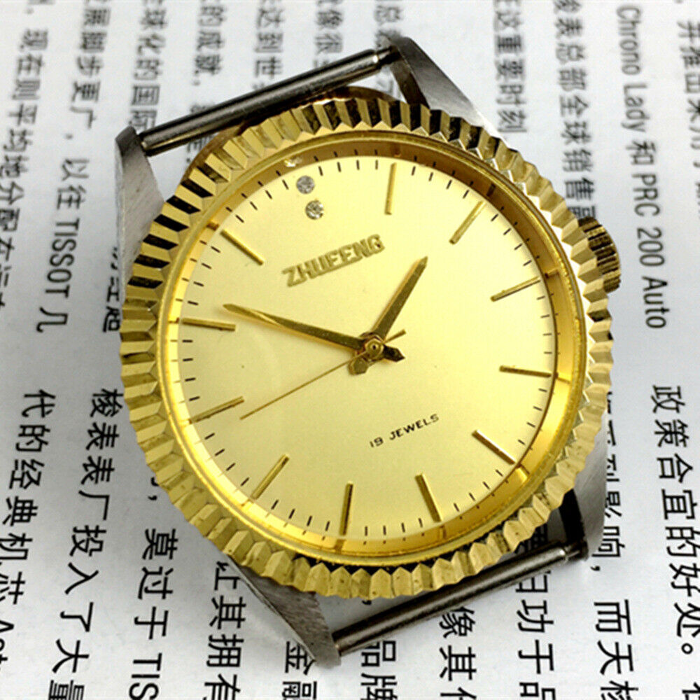 Round golden dial manual mechanical watch by Tianjin Factory, classic craftsmanship from China.