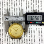 Round golden dial manual mechanical watch by Tianjin Factory, showcasing classic Chinese craftsmanship and timeless design.
