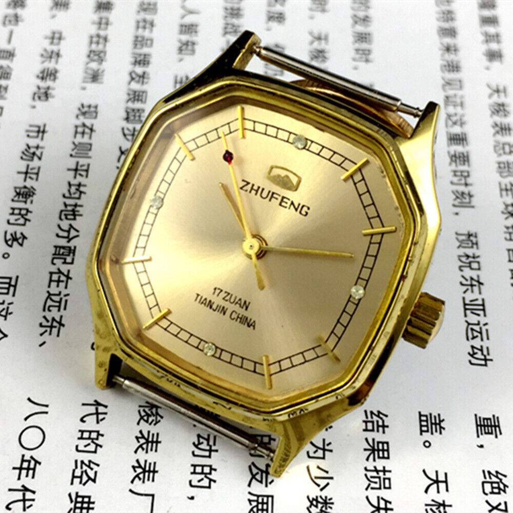 Octagonal golden dial mechanical watch by Tianjin Factory, classic design for elegant style and precision.