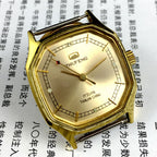 Octagonal golden dial manual mechanical watch by Tianjin Factory, classic style for elegant wristwear.