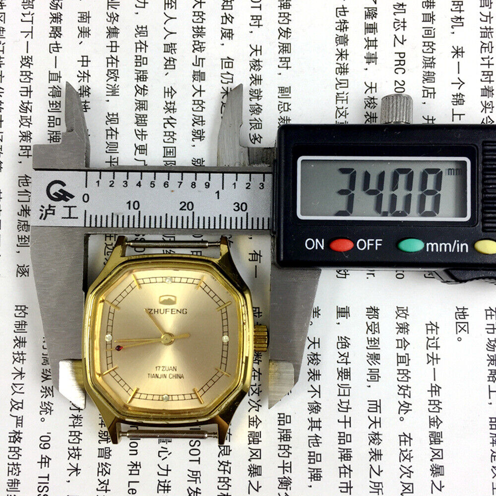 Octagonal golden dial manual mechanical watch by Tianjin Factory, classic design for elegant style and timeless charm.