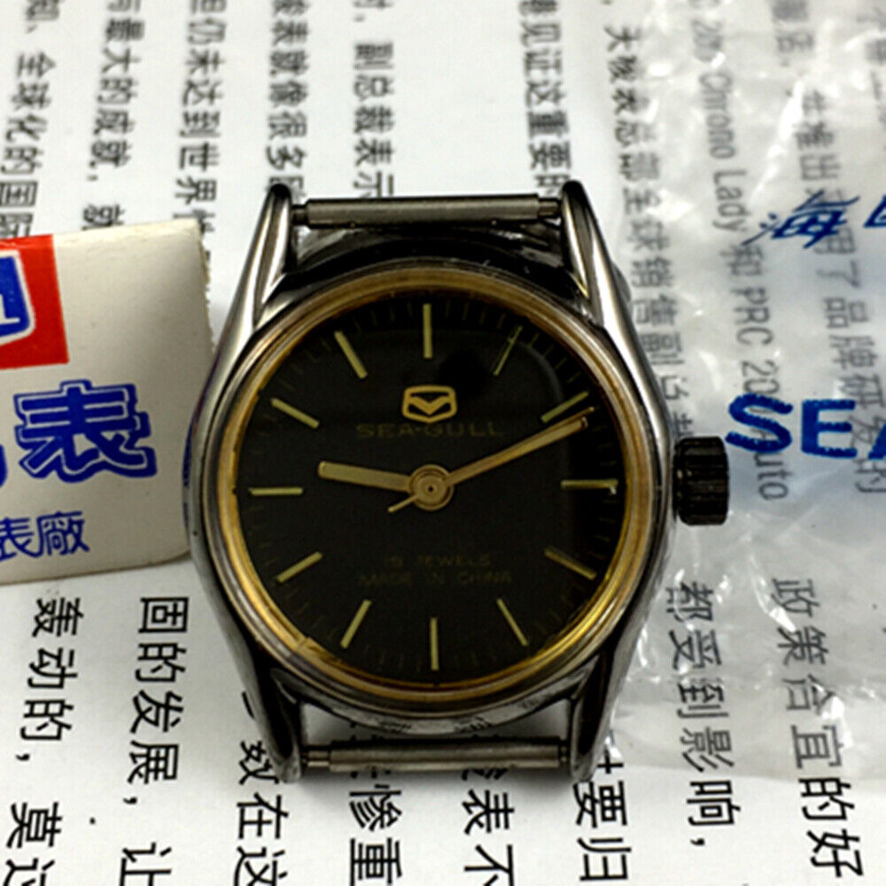 Black dial Seagull ladies mechanical watch with 19 jewels, Tianjin China craftsmanship, manual wind design.