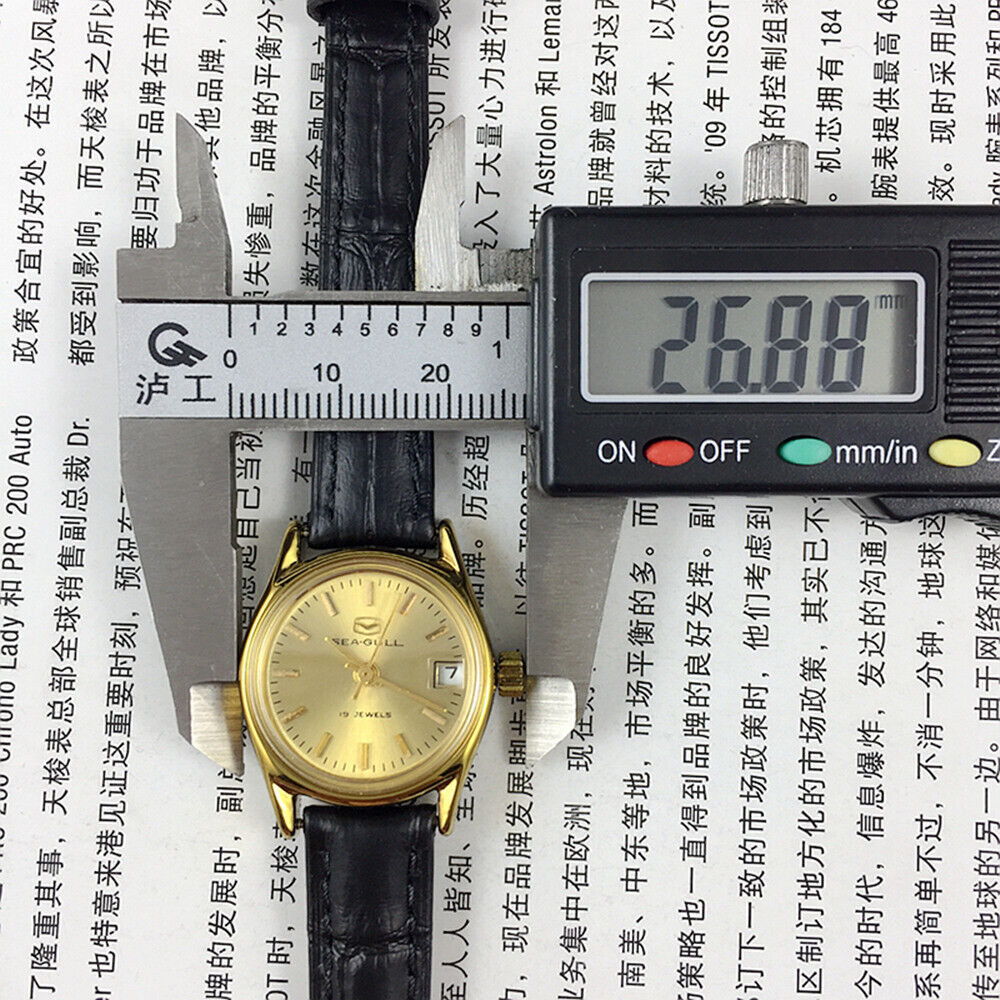 Golden dial Lady Watch by Seagull featuring 19 jewels and manual mechanical movement from Tianjin Factory.