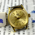 Golden dial Seagull manual mechanical ladies watch by Tianjin Factory, elegant style for everyday wear.