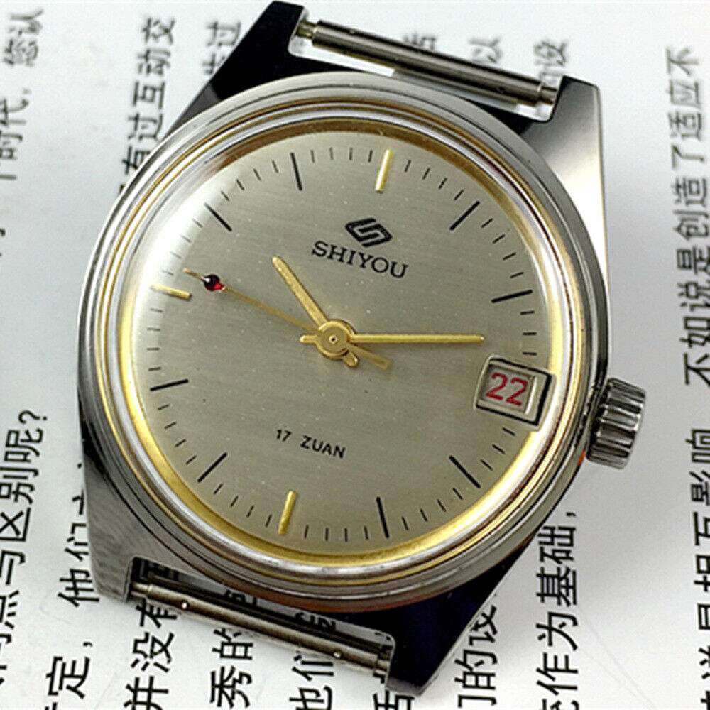 Shiyou 32mm grey manual mechanical watch featuring 17 jewels and single calendar display for classic timekeeping.