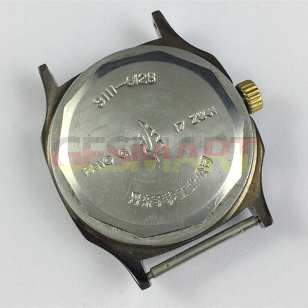 Black dial 34mm Dandong manual mechanical watch with gold markers and three hands, elegant design by Dandong.