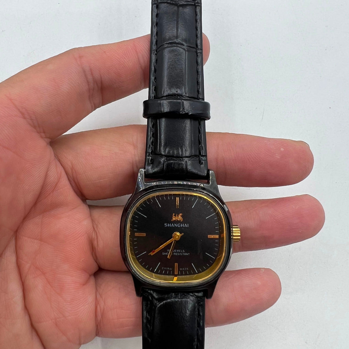 34mm Shanghai Factory manual mechanical watch with black dial, 19 jewels, shock-resistant design