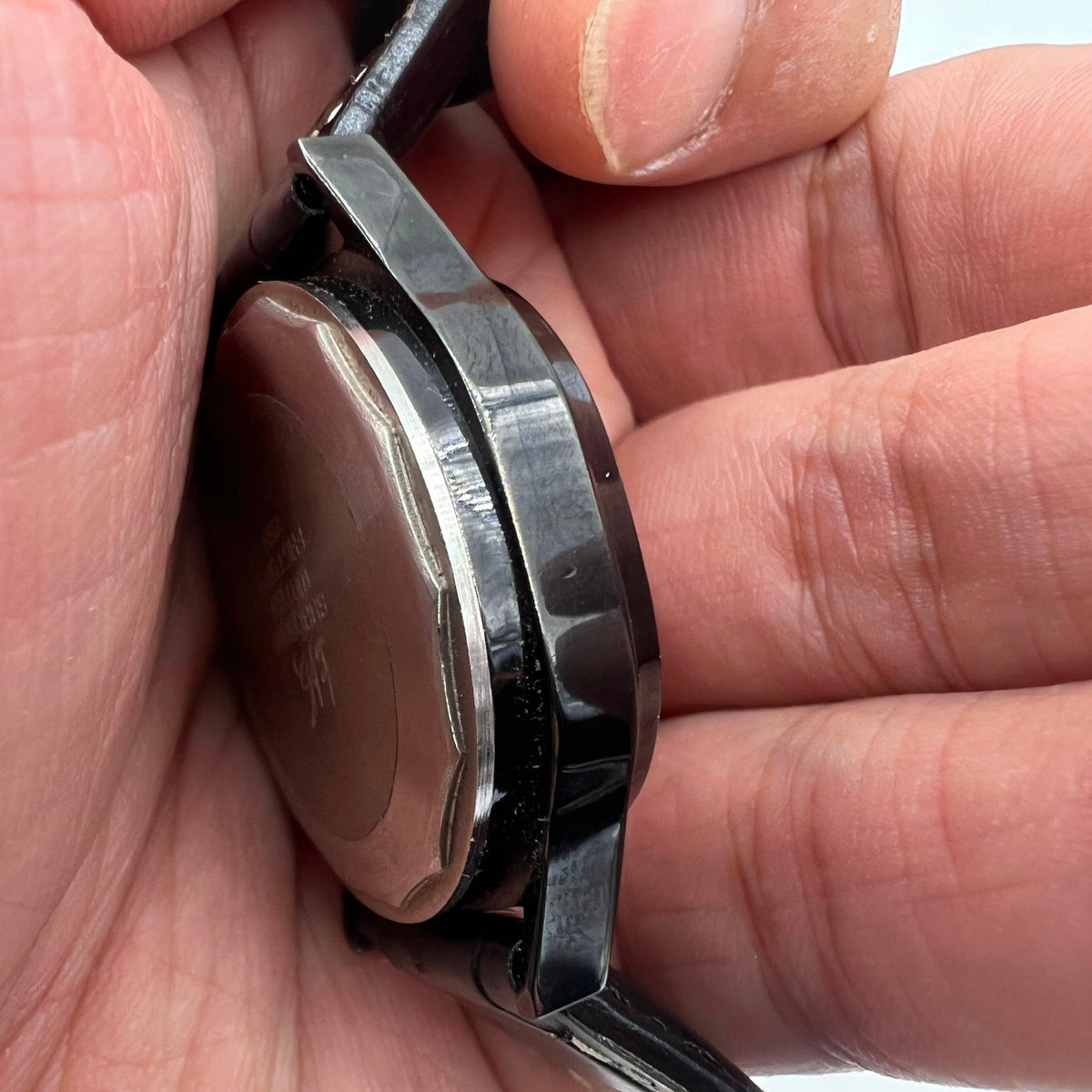 Shanghai Factory 34mm manual mechanical watch with black dial, 19 jewels, shock-resistant design for precise timekeeping