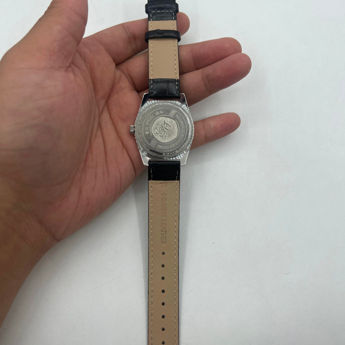 37mm Shanghai Factory 7120 men's manual mechanical watch with shock-resistant feature and classic design.