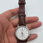 37mm China Baihua manual mechanical watch with silver dial, 19 jewels, shock-resistant design.