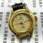 SHANGHAI DIAMOND manual mechanical lady watch with yellow dial and golden nail markers, elegant design.