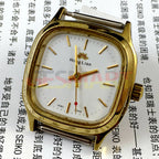 HONGLIAN manual mechanical watch with golden nail accents and square gold case, white dial for elegant style.